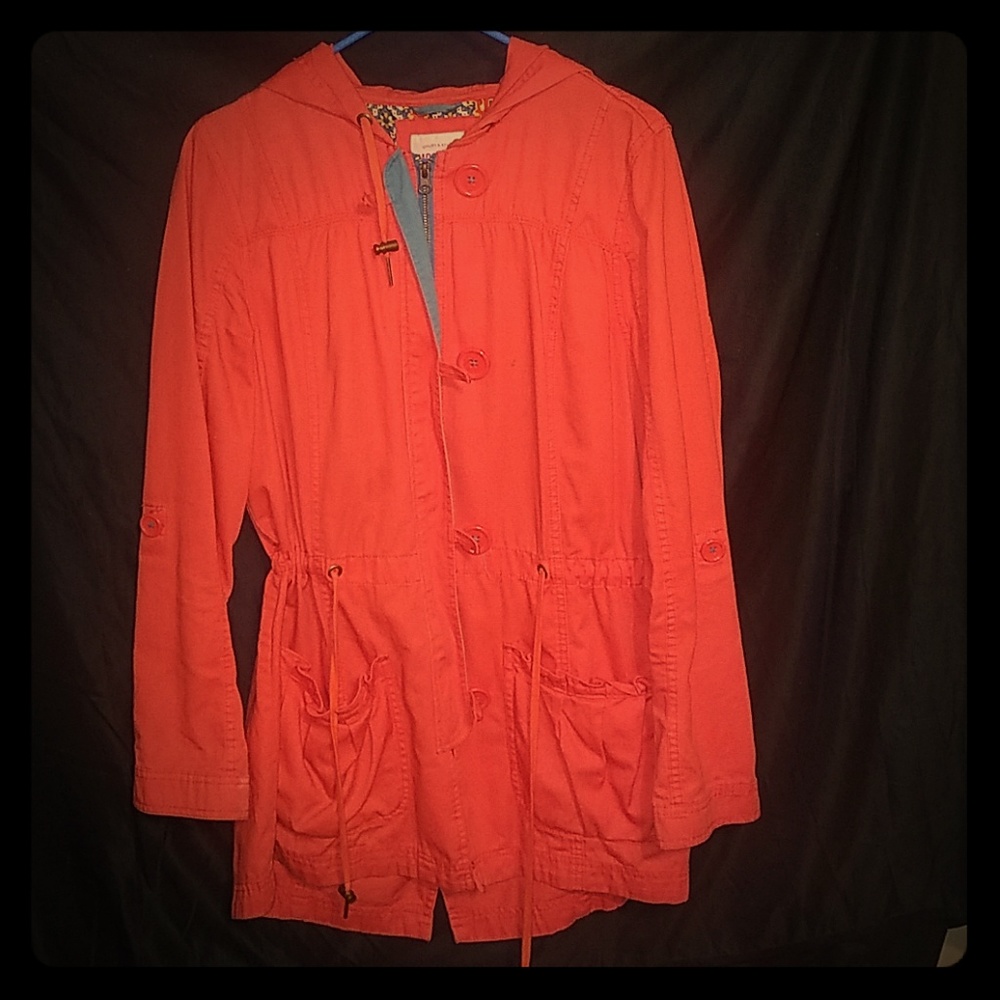 Salmon orange colored jacket with hood